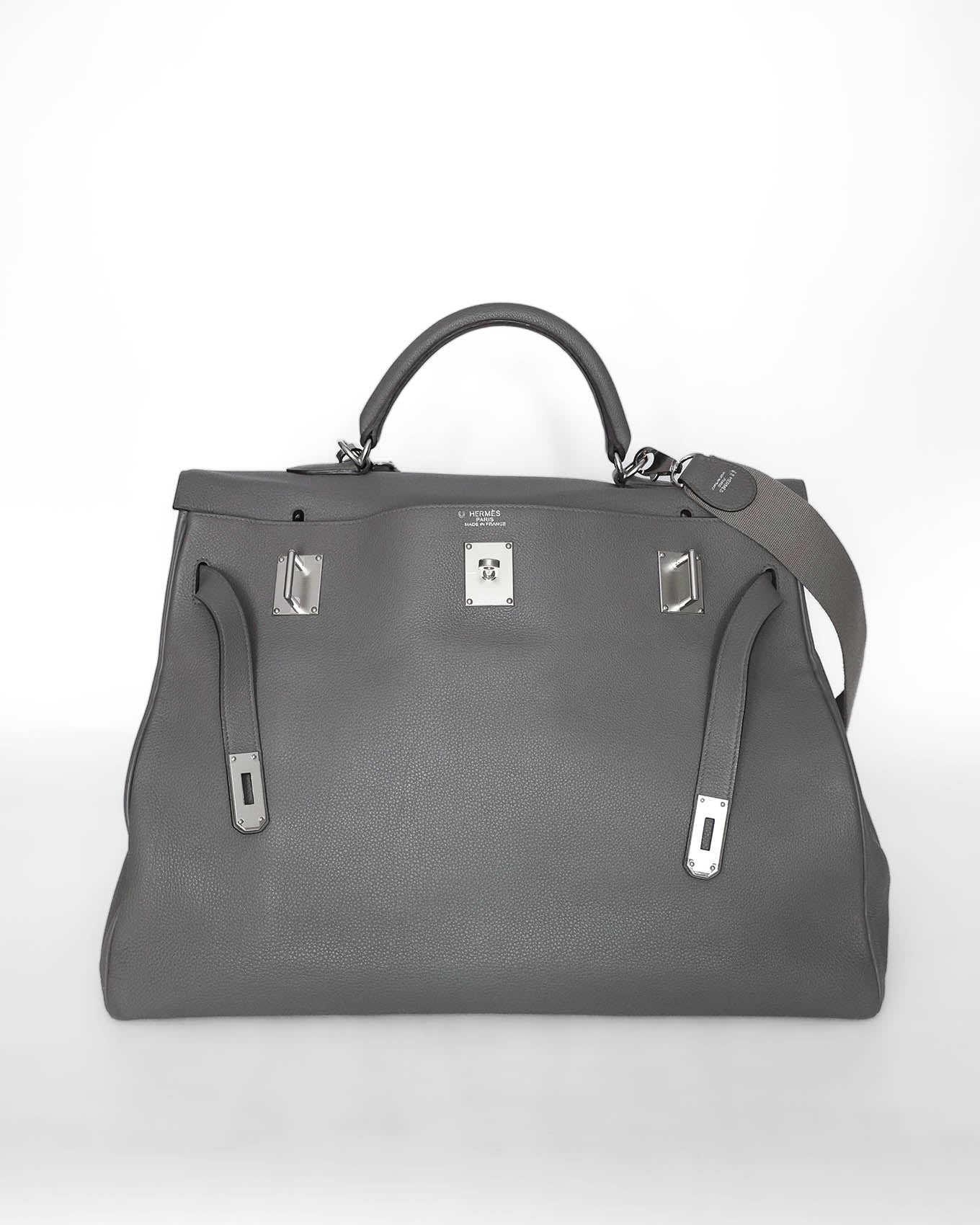 Rare Hermès HSS Kelly 50 Voyage travel bag in elephant‑grey matte Clémence leather, VIP‑commissioned (HSS stamp) with iconic turn‑lock and internal zipped & slit pockets